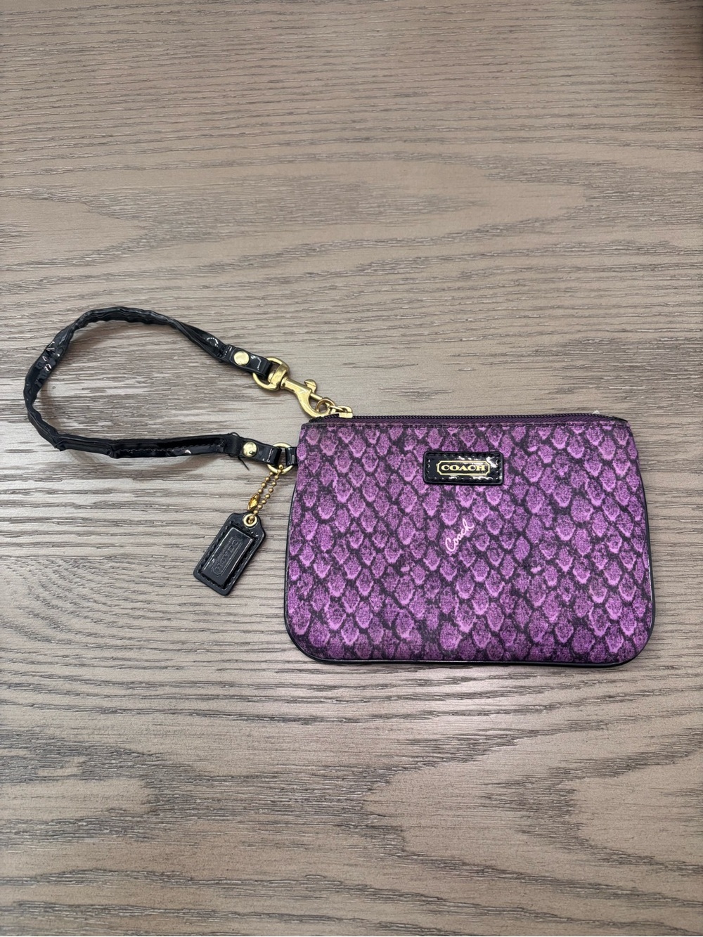 Coach Purple Patterned Signature Wristlet with Black Strap